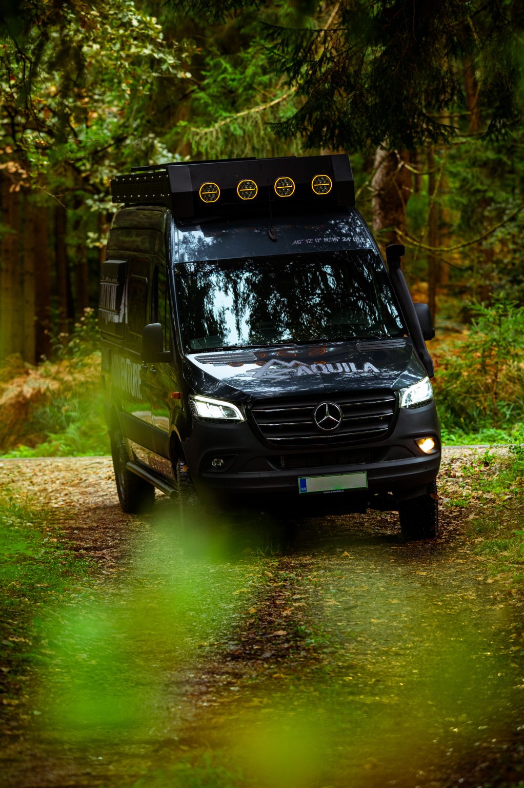 Aquila Adventure Stenar 4x4 in a forest; front view