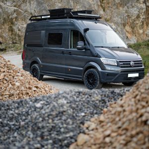 VW Crafter Creston 4x4 3/4 front view; parked in a quarry